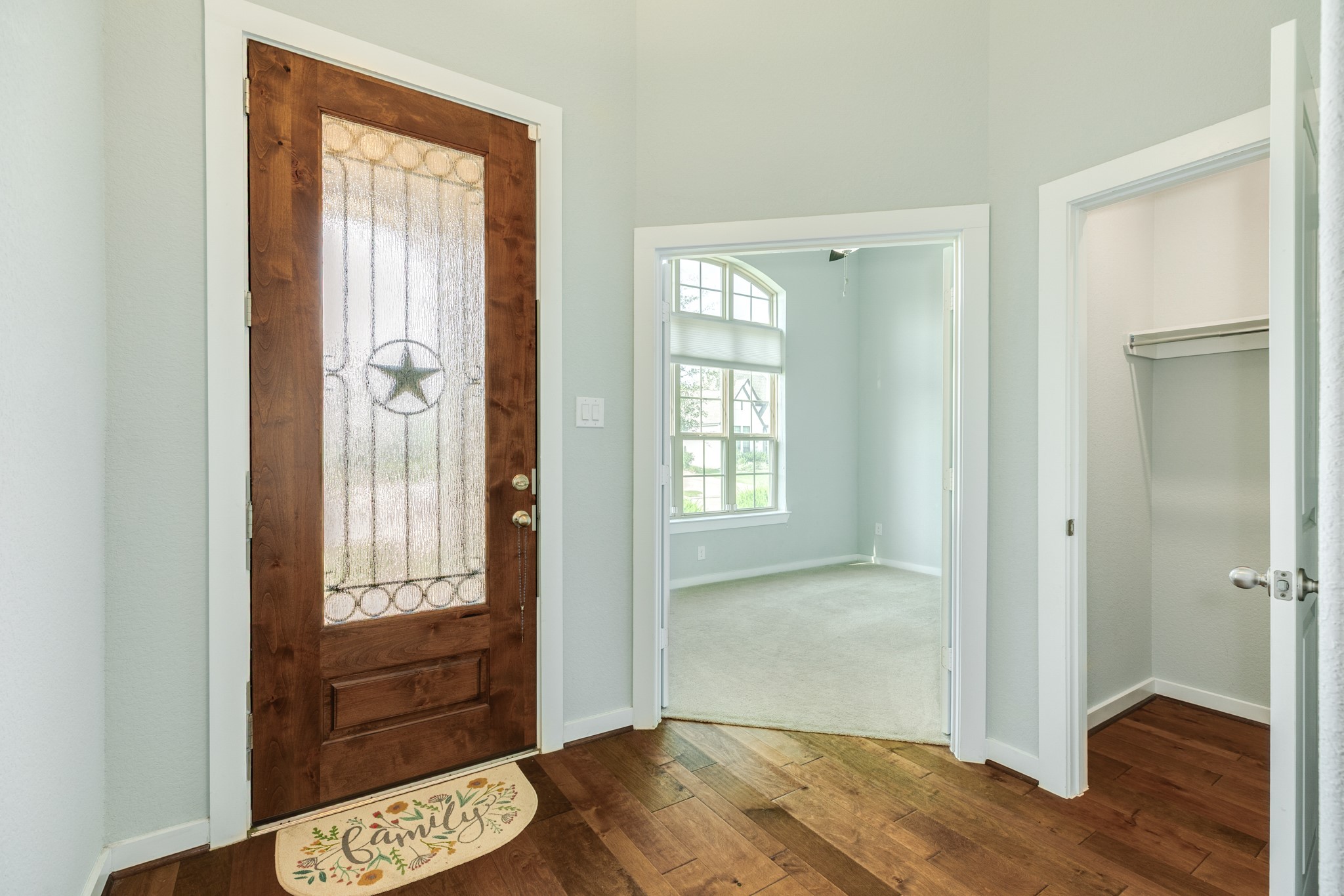 4015 Shackleton Court Iowa Colony, TX 77583 - Photo 3 of 50 You are greeted at the front door with these beautiful, warm hardwood floors that extend throughout the main living areas, adding a touch of elegance and durability to the home's open-concept design.