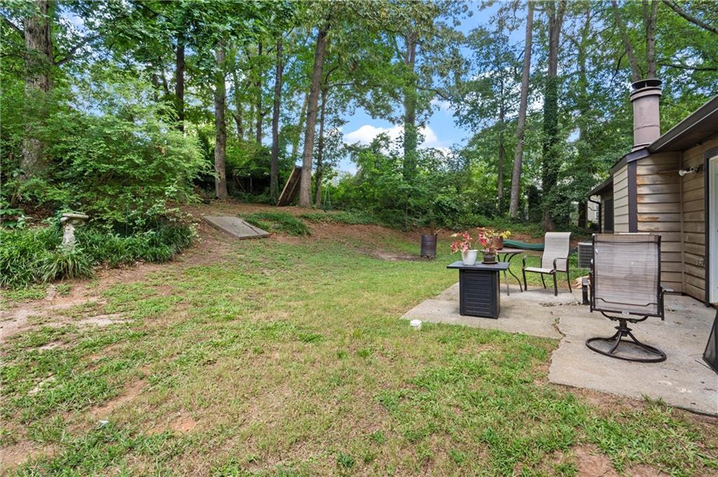 573 Fieldstream Way Northwest Lawrenceville, GA 30044 - Photo 18 of 20 a view of a backyard with a patio