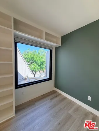 a view of a room that has a window