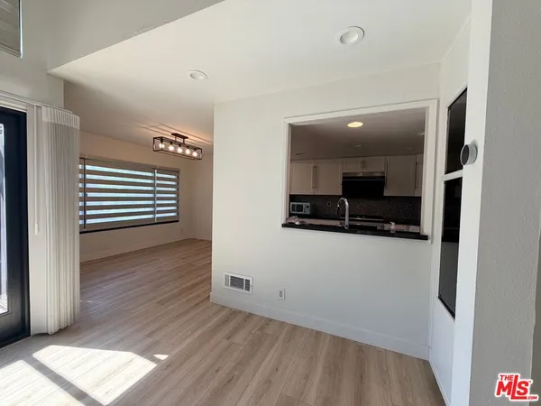 a view of kitchen and utility room