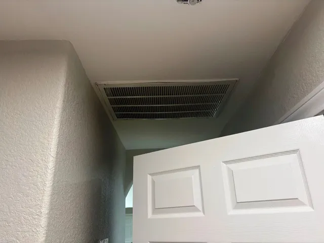 a room with toys and dresser