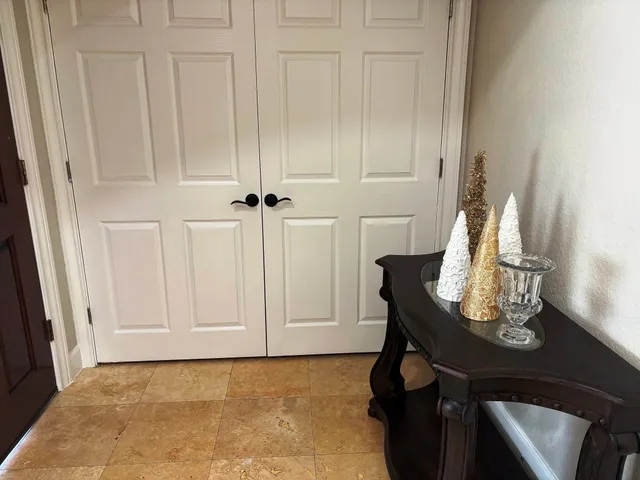 a view of a livingroom with furniture and hardwood floor