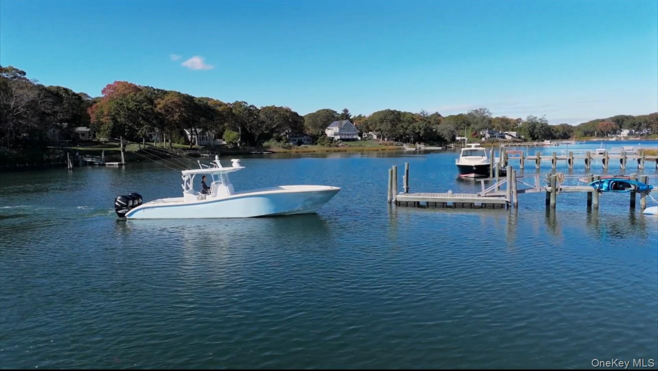 2280 Deep Hole Drive Mattituck, NY 11952 - Photo 26 of 35 Deepwater dock for multiple boats and easy access to Peconic Bay