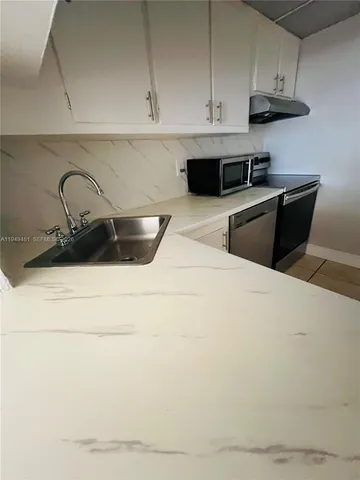 $1,750 | 1470 Northeast 123rd Street, Unit A408, North Miami, FL 33161