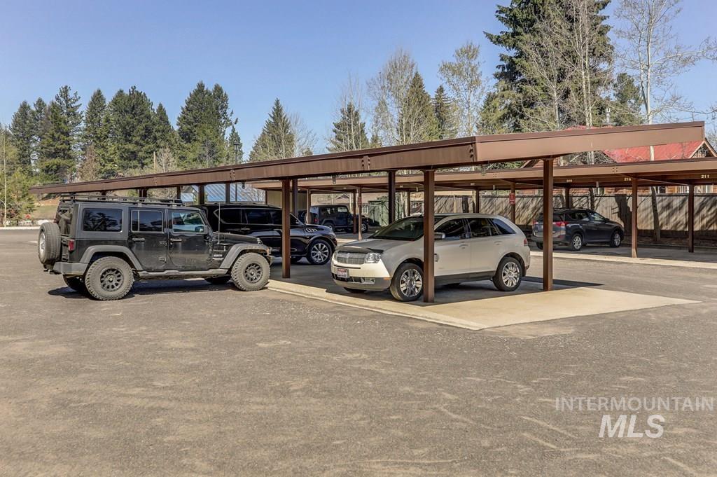 616 North 3rd Street, Unit 304 McCall, ID 83638 - Photo 5 of 38 View of covered parking lot