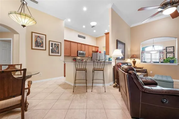 a view of a kitchen with furniture and a window