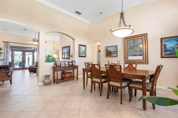 a dining room with furniture and window