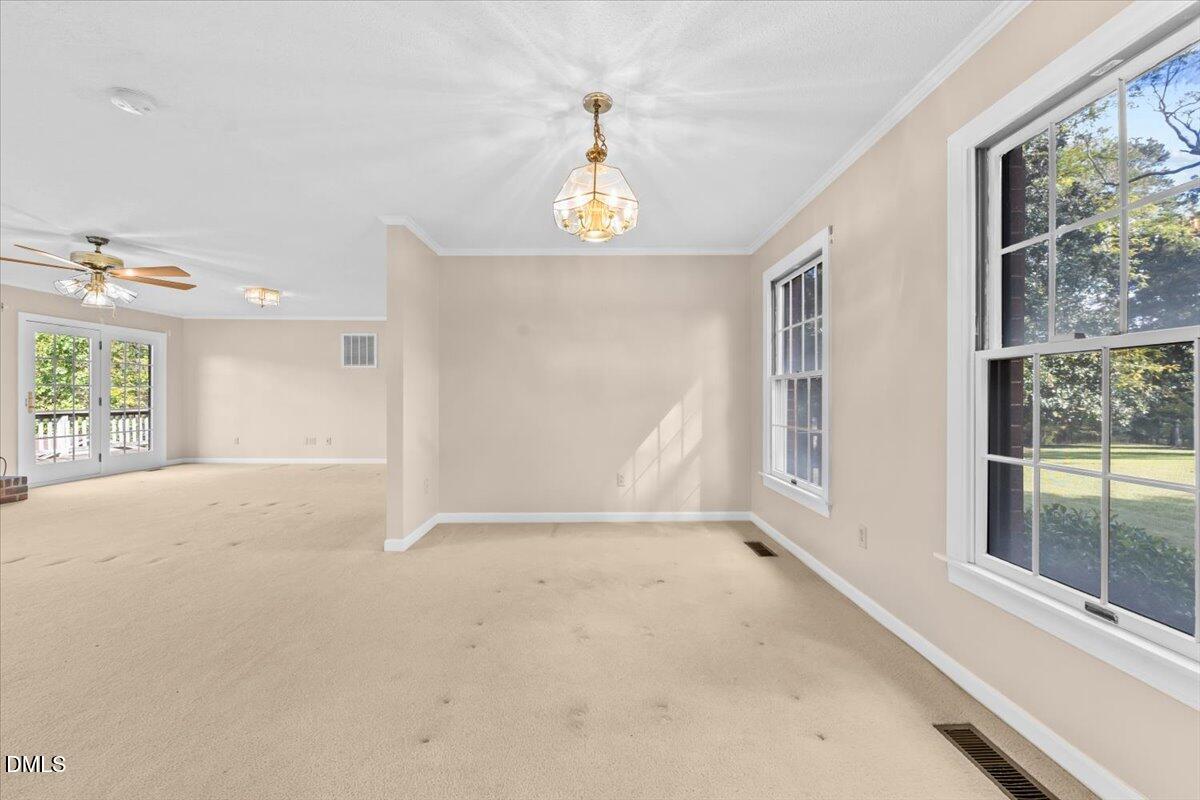 6464 Bonlee Road Bear Creek, NC 27207 - Photo 28 of 82 an empty room with windows and entrance