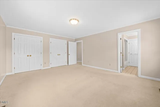 a kitchen with refrigerator cabinets and a sink