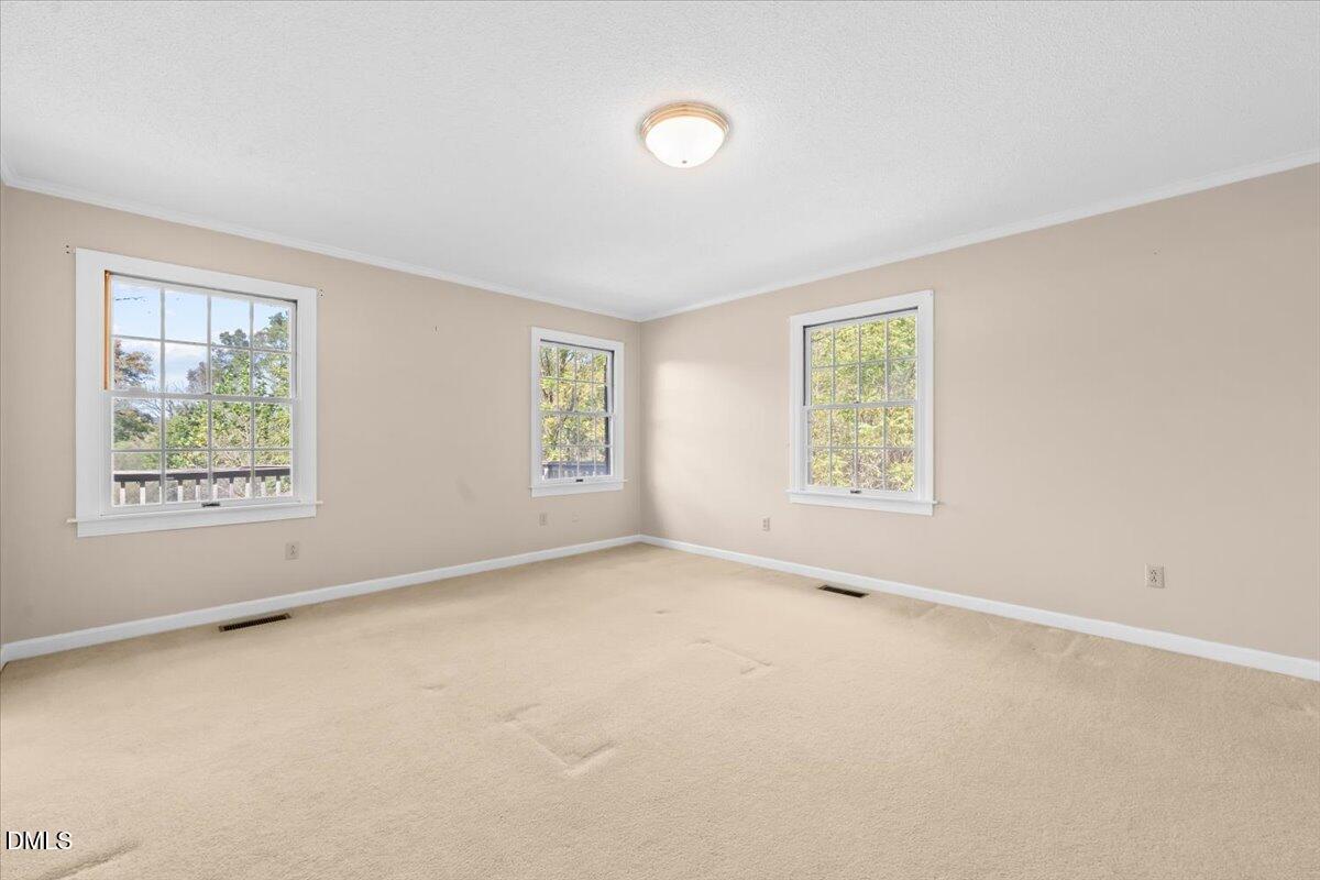 6464 Bonlee Road Bear Creek, NC 27207 - Photo 32 of 82 an empty room with windows