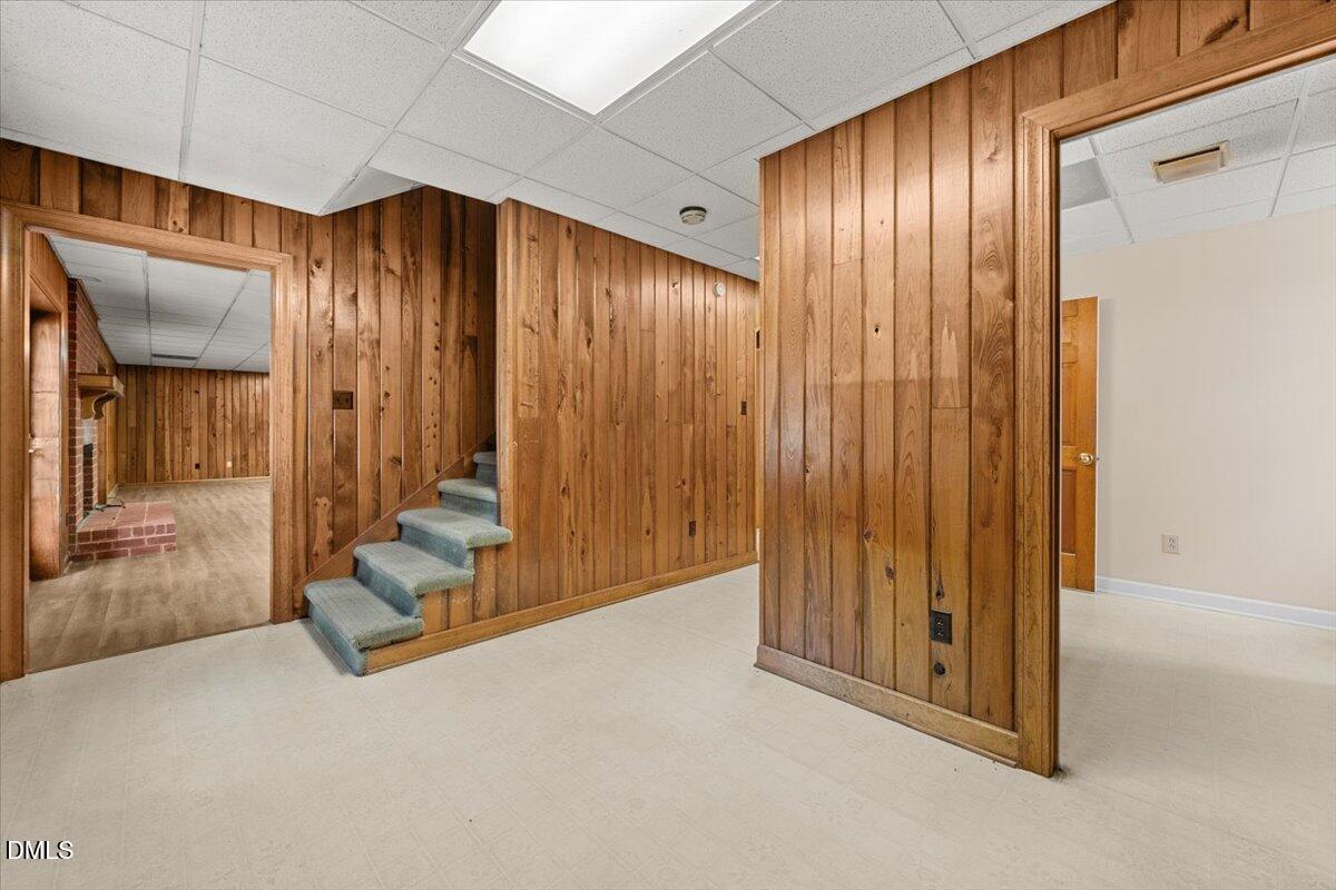 6464 Bonlee Road Bear Creek, NC 27207 - Photo 58 of 82 an empty room with wooden floor and windows