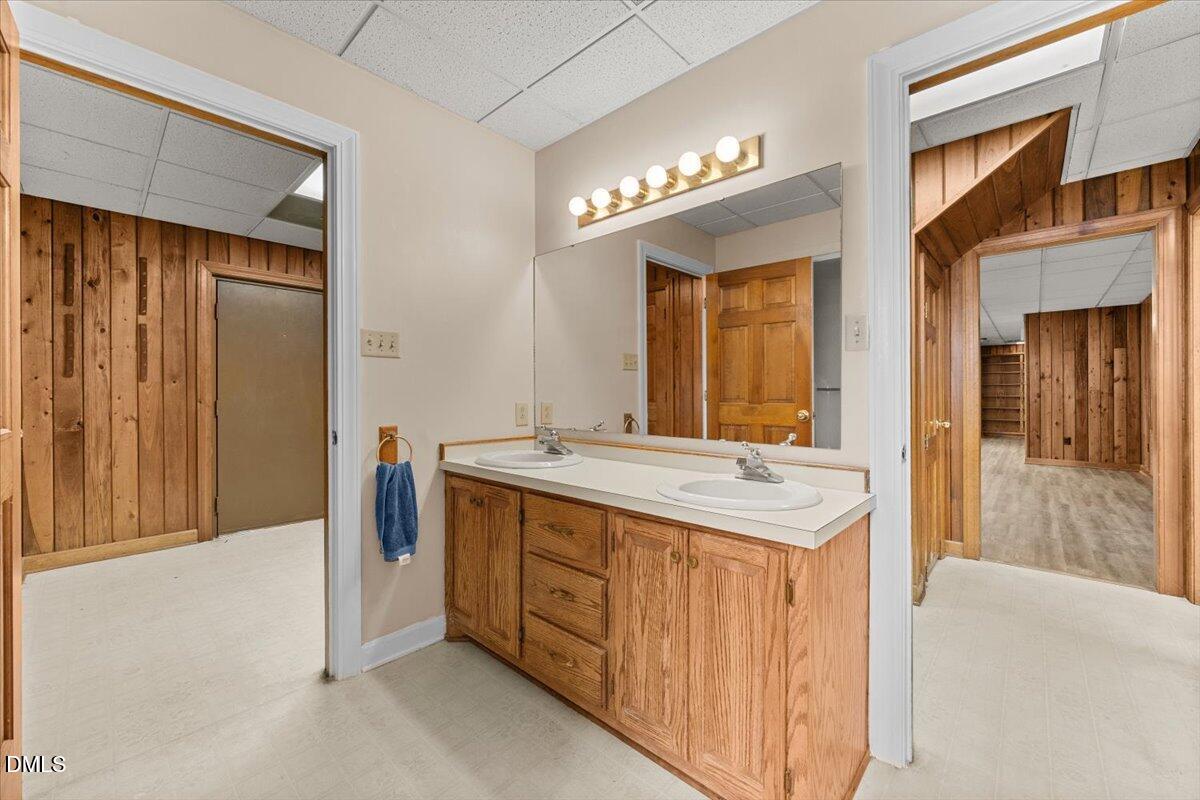6464 Bonlee Road Bear Creek, NC 27207 - Photo 61 of 82 a bathroom with a sink and a mirror