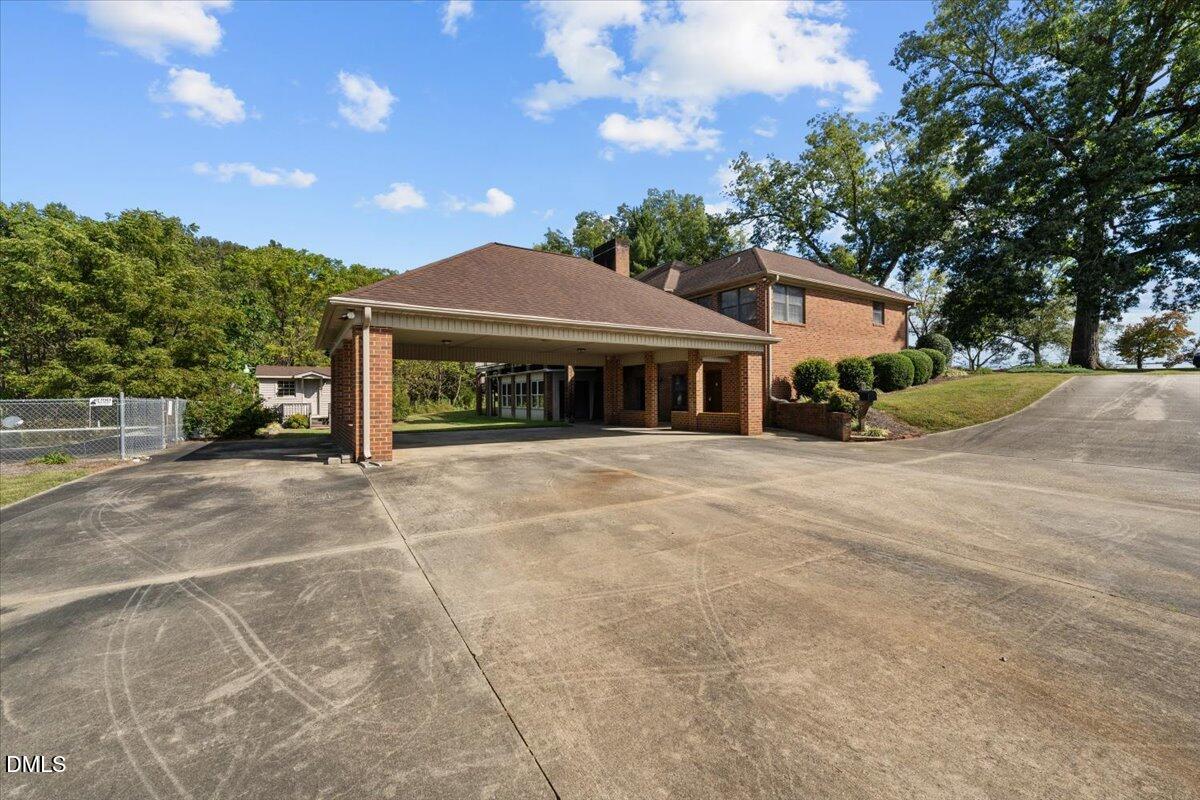 6464 Bonlee Road Bear Creek, NC 27207 - Photo 67 of 82 a front view of a house with a garden