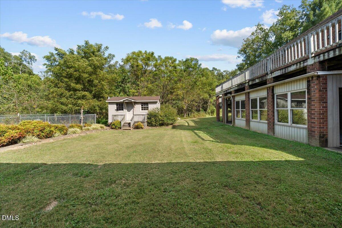6464 Bonlee Road Bear Creek, NC 27207 - Photo 69 of 82 a view of a house with a yard