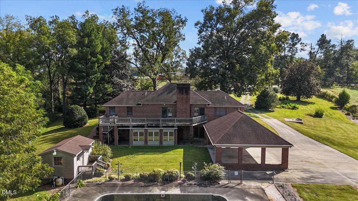 6464 Bonlee Road Bear Creek, NC 27207 - Photo 70 of 82 an aerial view of a house with swimming pool garden and patio