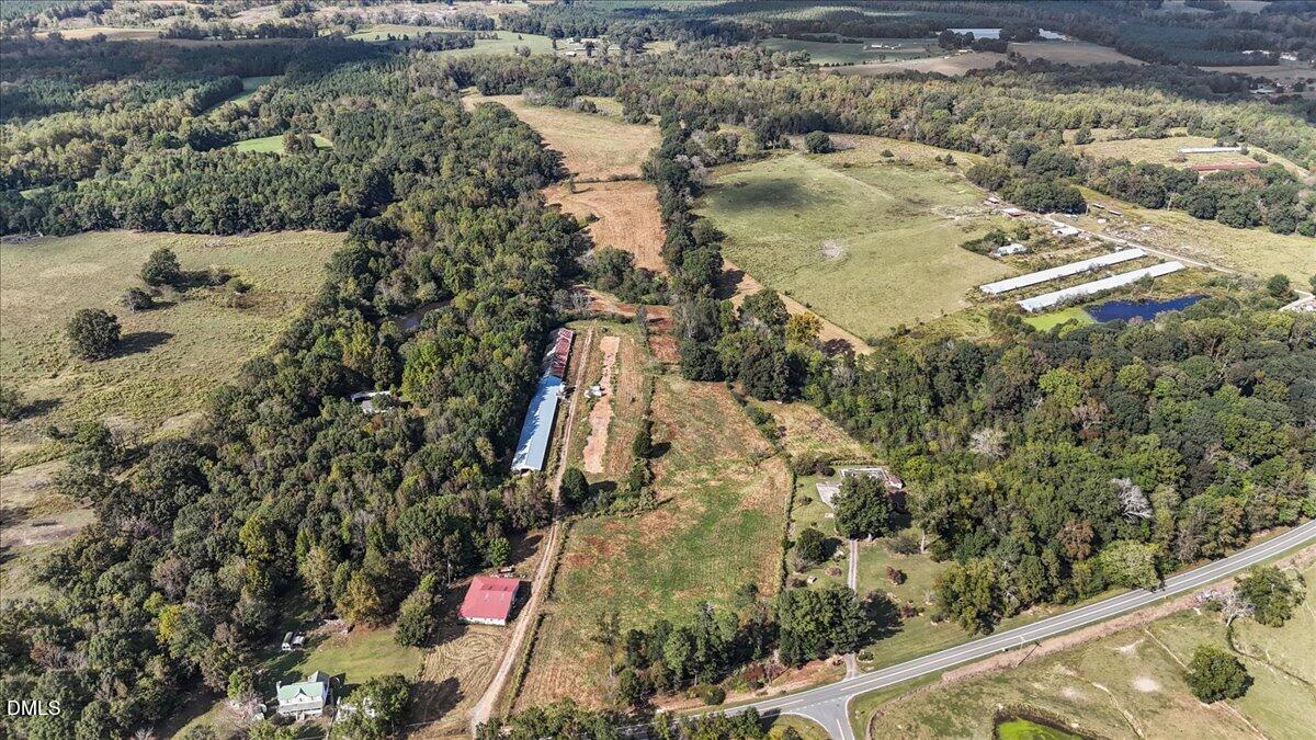 6464 Bonlee Road Bear Creek, NC 27207 - Photo 72 of 82 an aerial view of residential houses with outdoor space