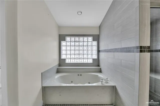 a bathroom with a toilet and a sink