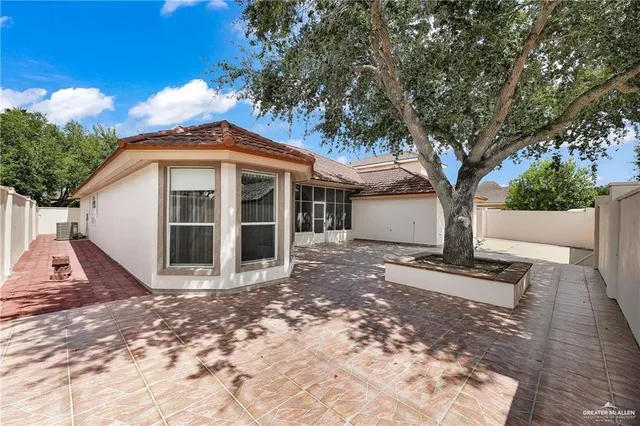 a view of backyard with green space