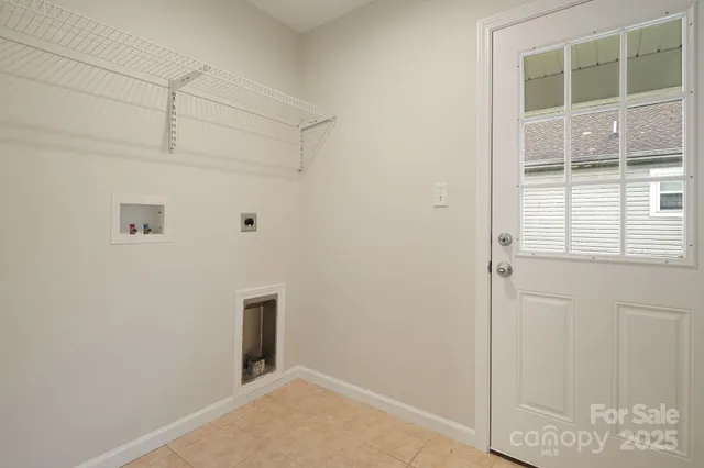 a view of a hallway with closet