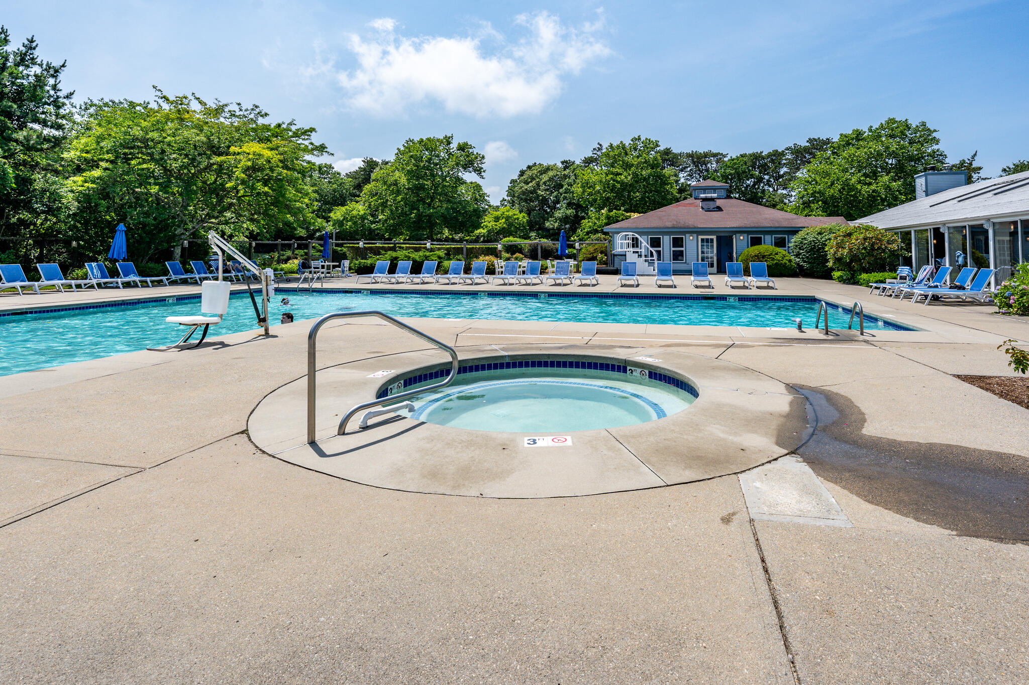 104 Howland Circle, Unit 104 Brewster, MA 02631 - Photo 27 of 29 a swimming pool with outdoor seating yard and barbeque oven
