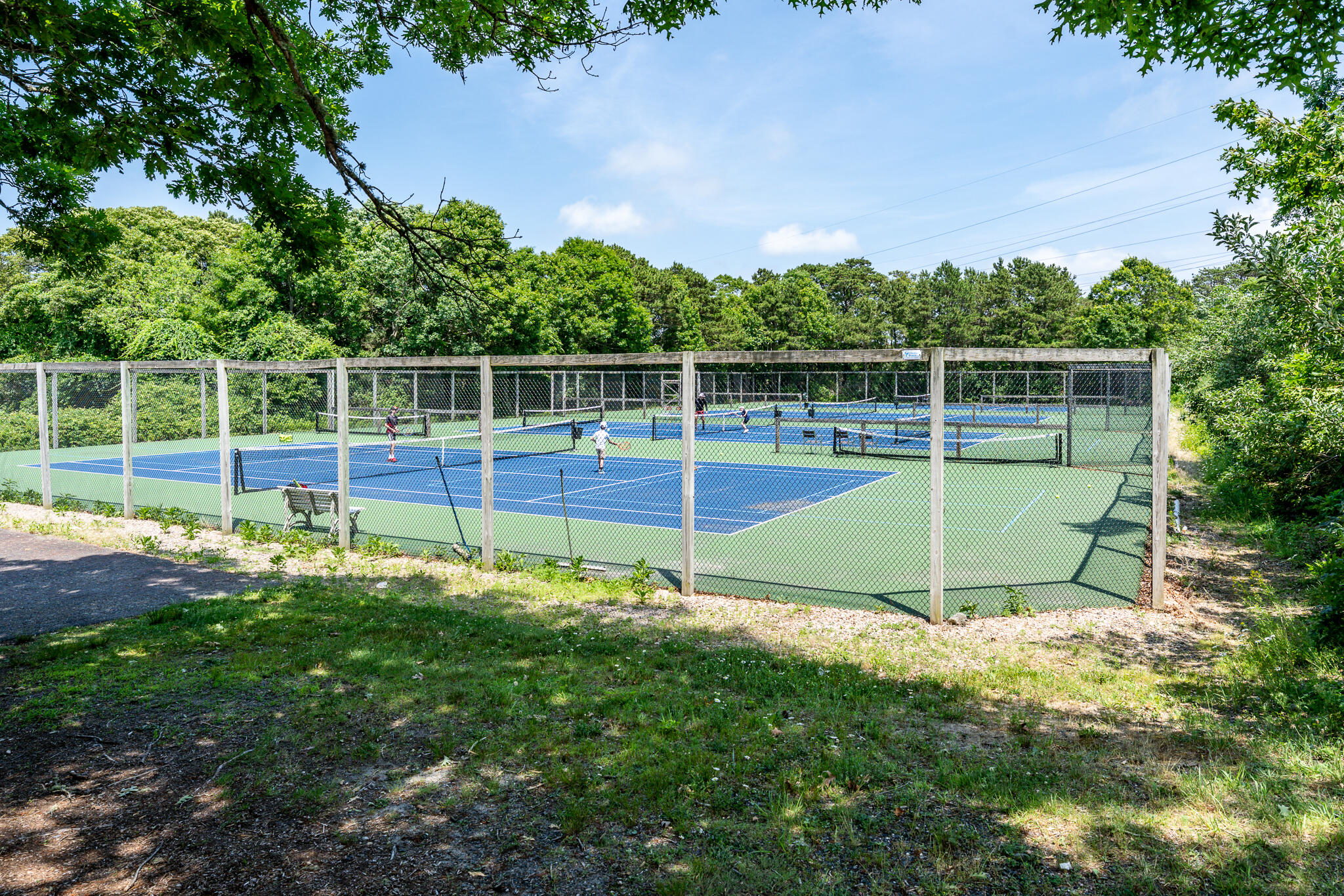 104 Howland Circle, Unit 104 Brewster, MA 02631 - Photo 28 of 29 a view of a backyard with swimming pool