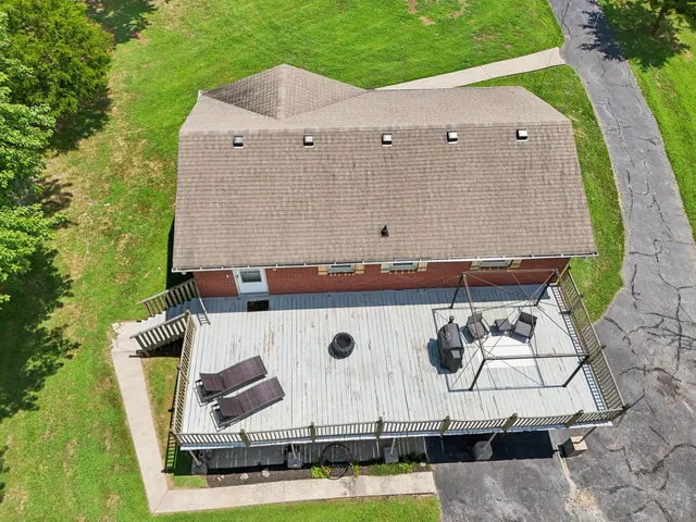 a view of front of house with a yard
