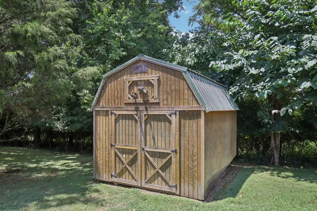 a view of swimming pool from a balcony