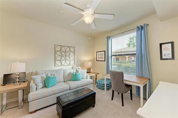 a living room with furniture and a window
