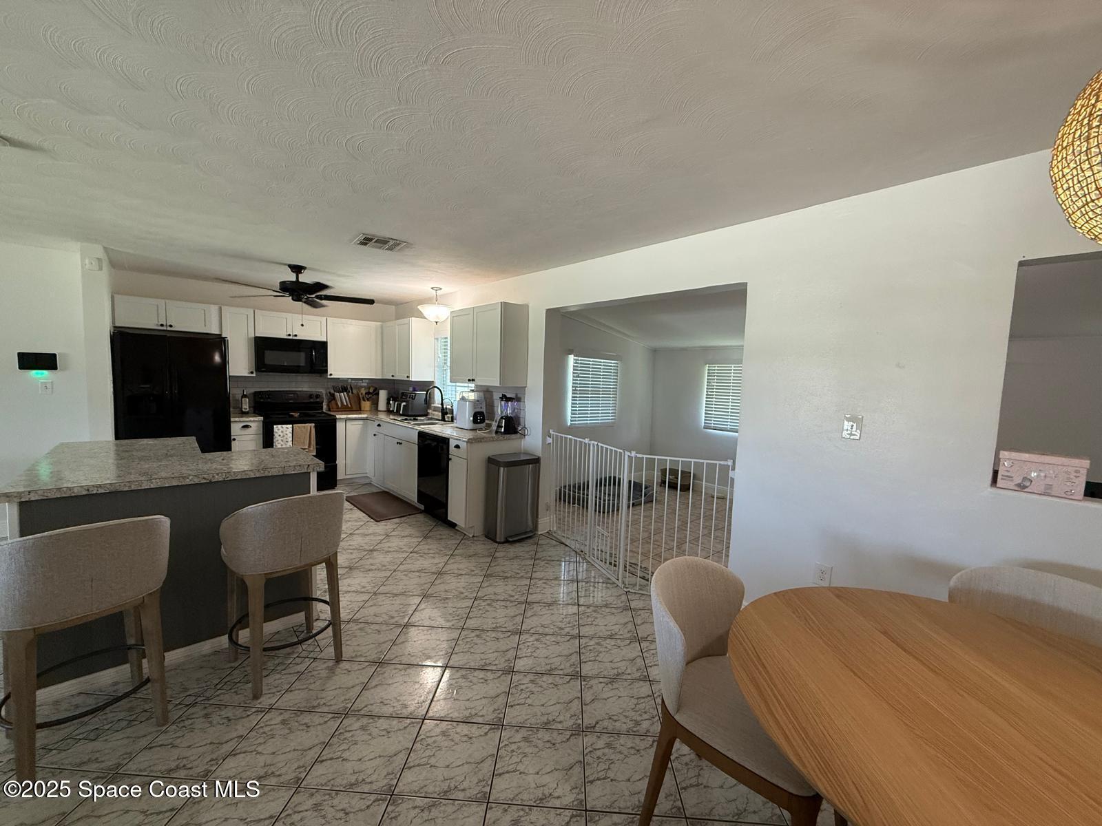 2394 Shenandoah Road Palm Bay, FL 32905 - Photo 13 of 23 Kitchen view