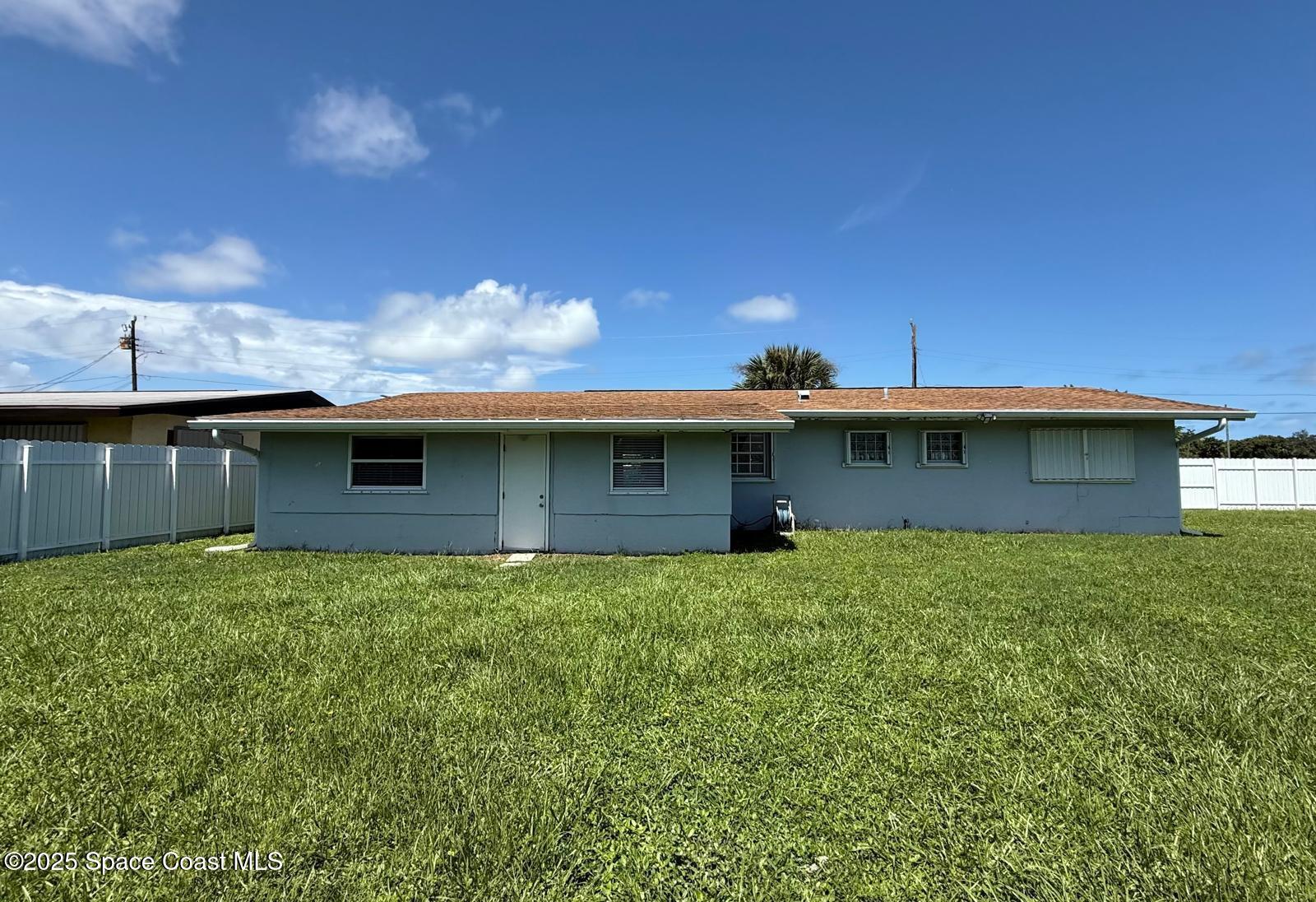 2394 Shenandoah Road Palm Bay, FL 32905 - Photo 19 of 23 Back view of house
