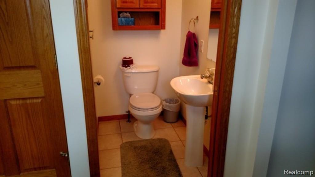 11633 Wilkes Road Yale, MI 48097 - Photo 11 of 30 This is a view of the half bath off of the laundry room.