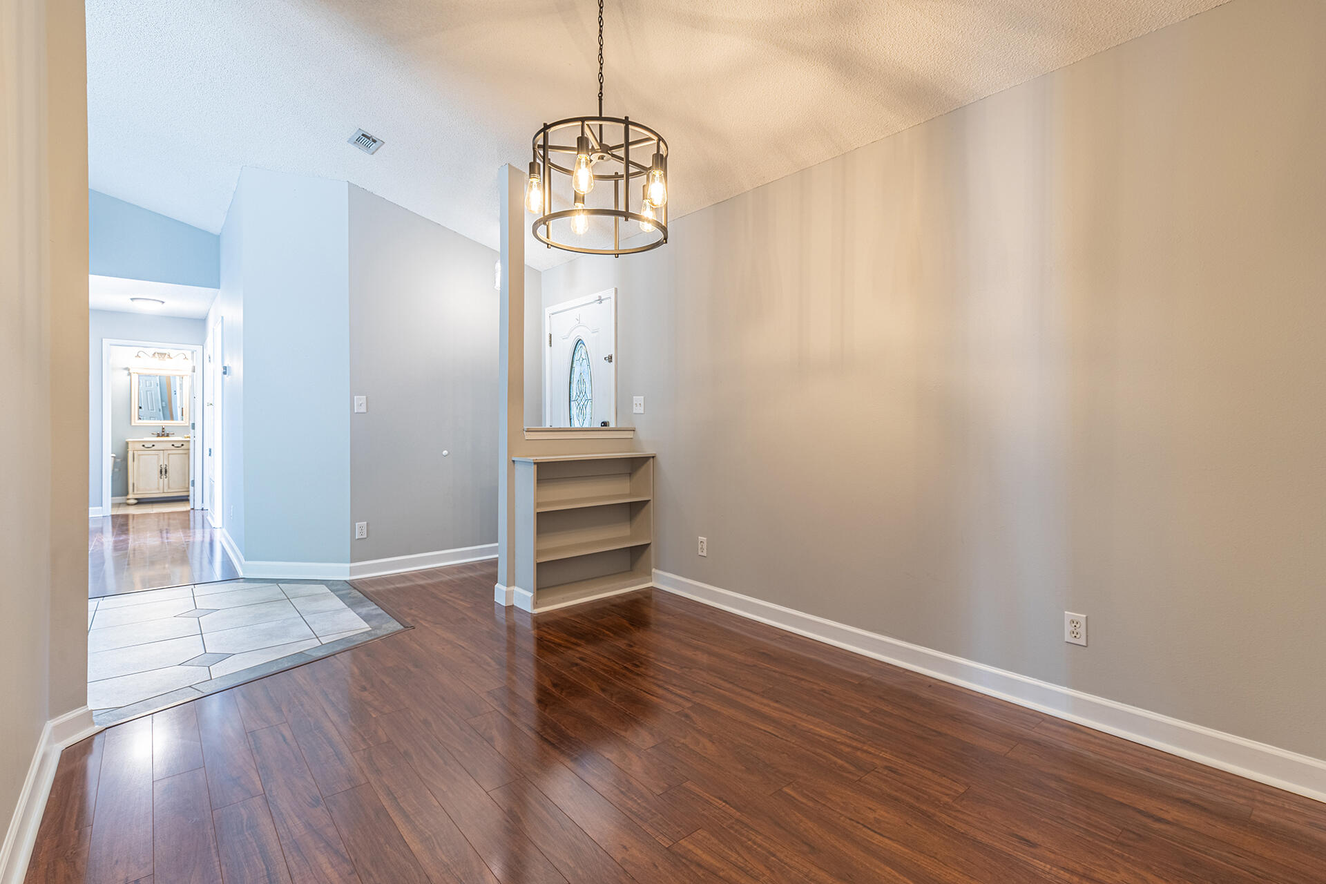 2500 Cameron Way Navarre, FL 32566 - Photo 12 of 32 a view of empty room with wooden floor and window