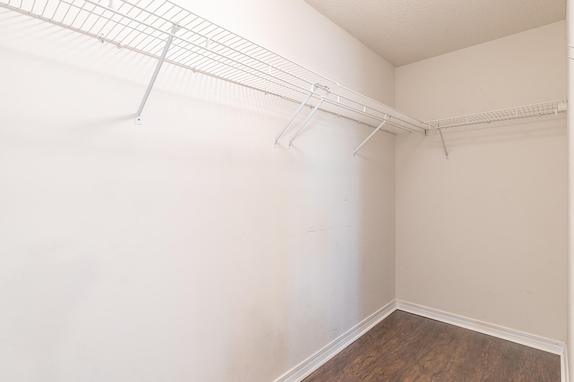 2500 Cameron Way Navarre, FL 32566 - Photo 20 of 32 a view of a room with racks on the wall