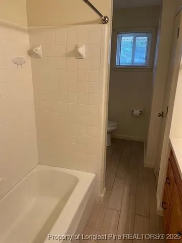 a bathroom with a toilet