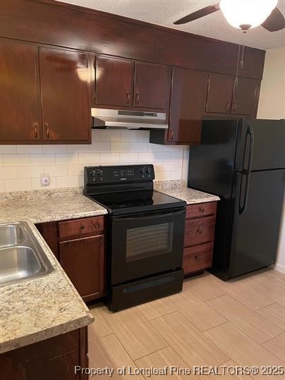 816 Shaw Mill Road Fayetteville, NC 28311 - Photo 5 of 13 a kitchen with a sink and cabinets