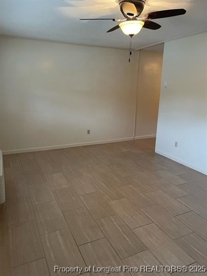 816 Shaw Mill Road Fayetteville, NC 28311 - Photo 6 of 13 a view of a livingroom with a chandelier fan