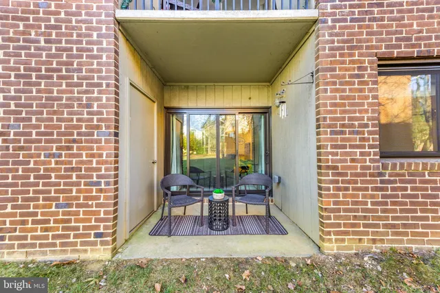 a swimming pool with outdoor seating