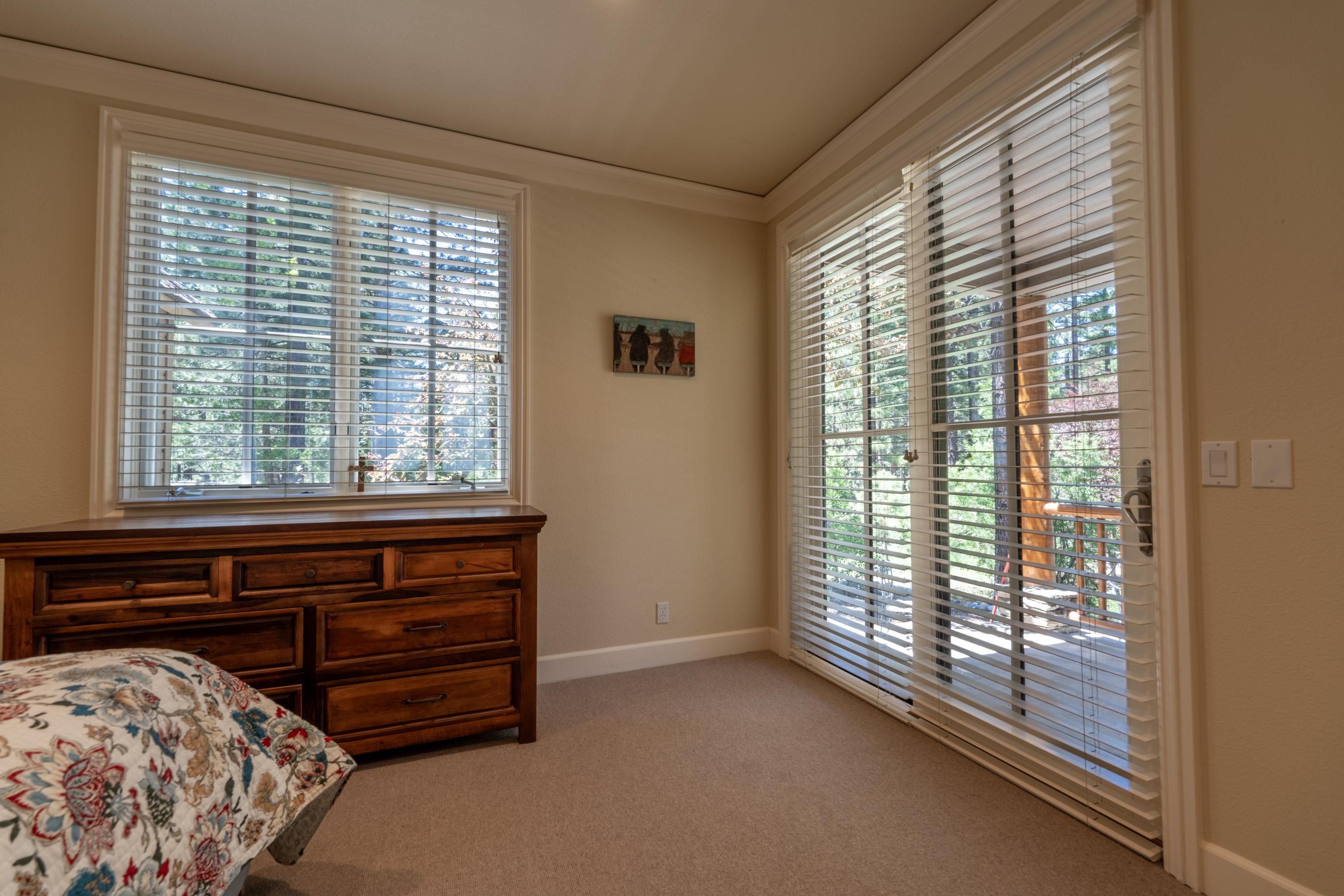 40 Hawk Ridge Clio, CA 96106 - Photo 14 of 42 a room with a bed and a large window