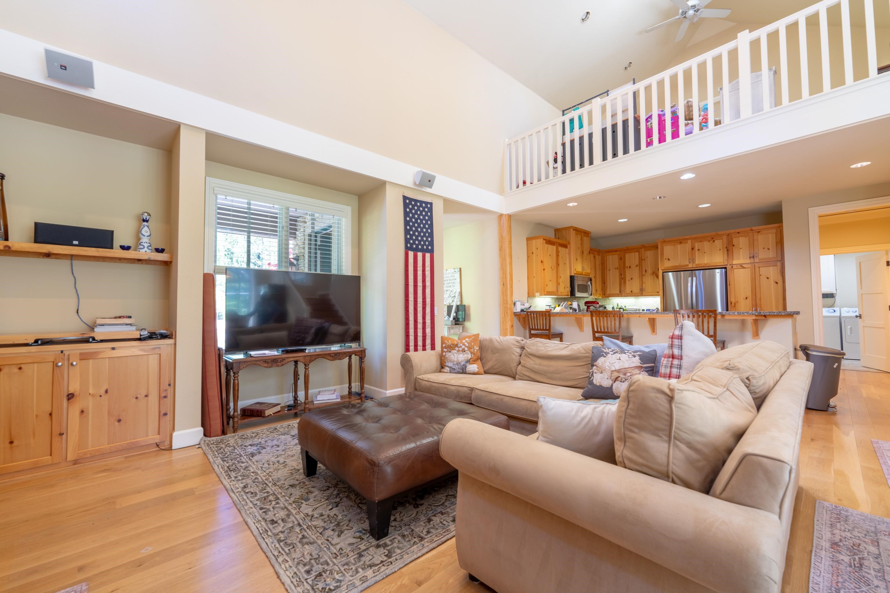 40 Hawk Ridge Clio, CA 96106 - Photo 9 of 42 a living room with furniture and a flat screen tv