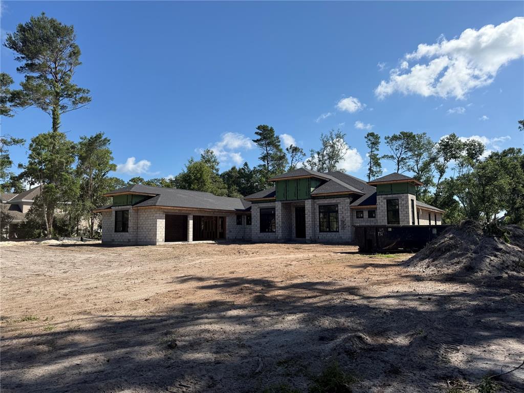 35 Broadriver Road Ormond Beach, FL 32174 - Photo 1 of 9 a front view of a house with a yard