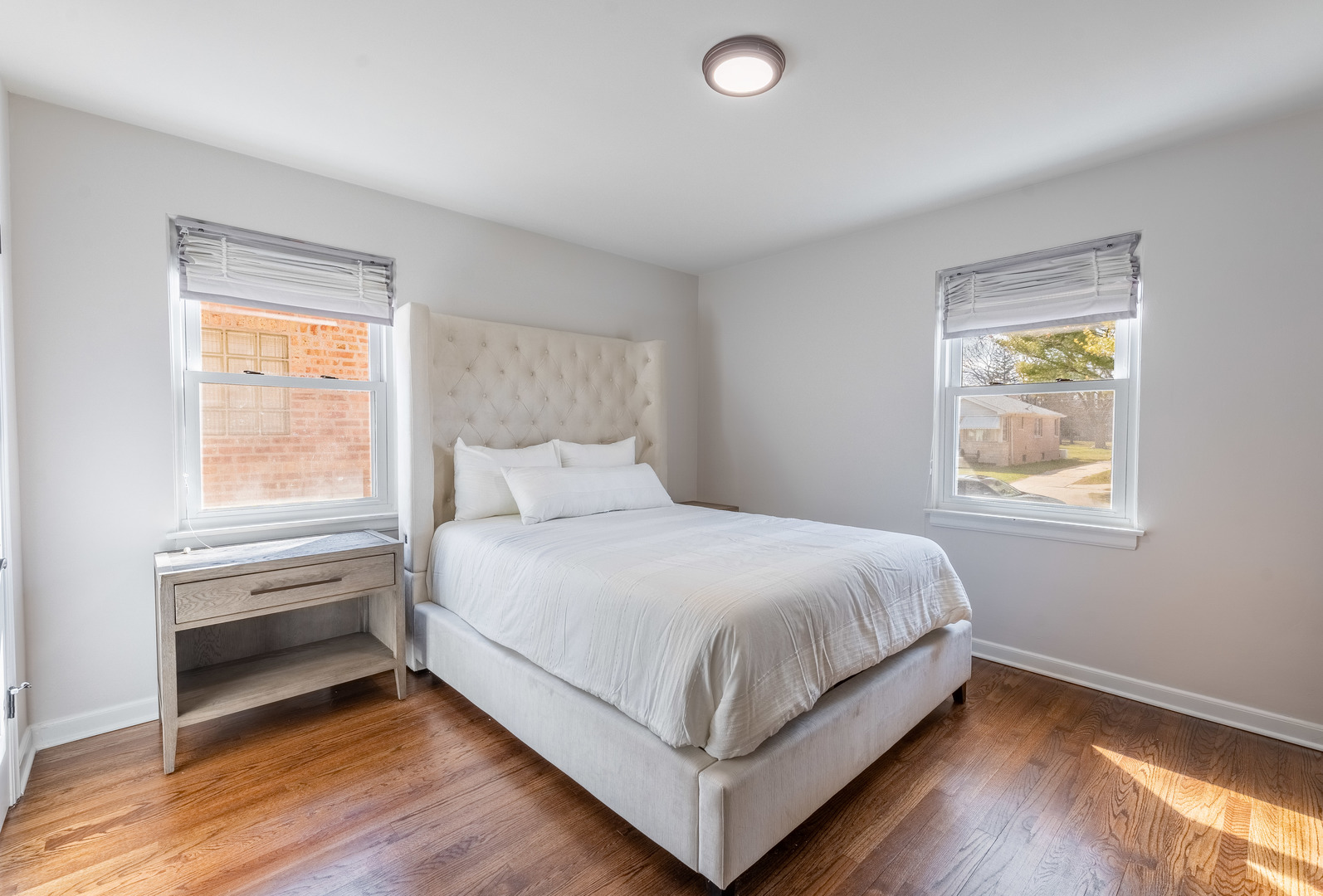 2335 14th Avenue North Riverside, IL 60546 - Photo 11 of 33 a bedroom with a bed and a window