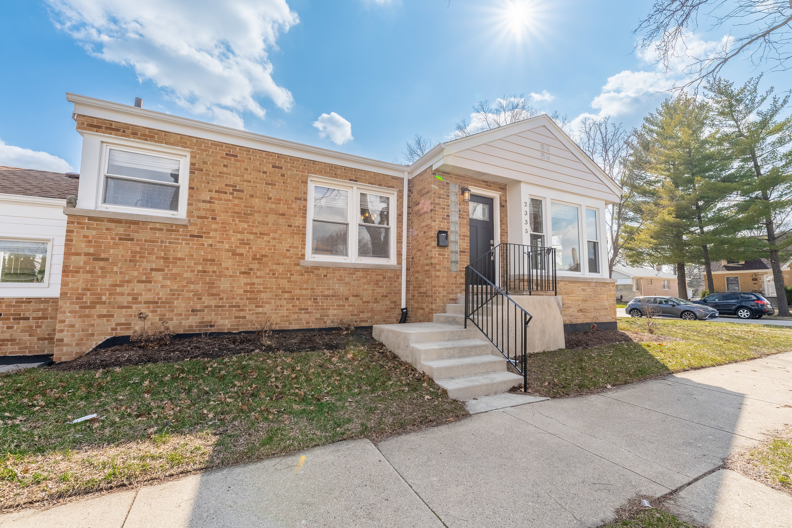 2335 14th Avenue North Riverside, IL 60546 - Photo 2 of 33 a front view of a house with garden