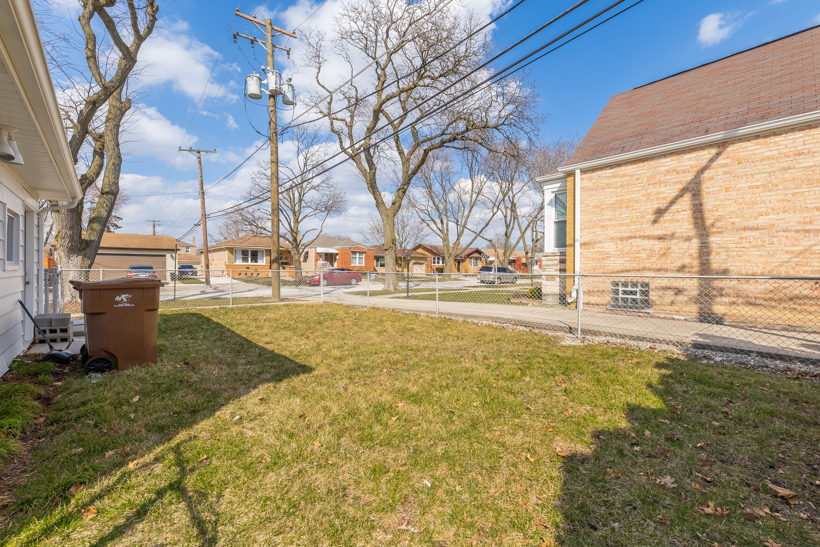 2335 14th Avenue North Riverside, IL 60546 - Photo 29 of 33 a view of residential houses with yard and swimming pool