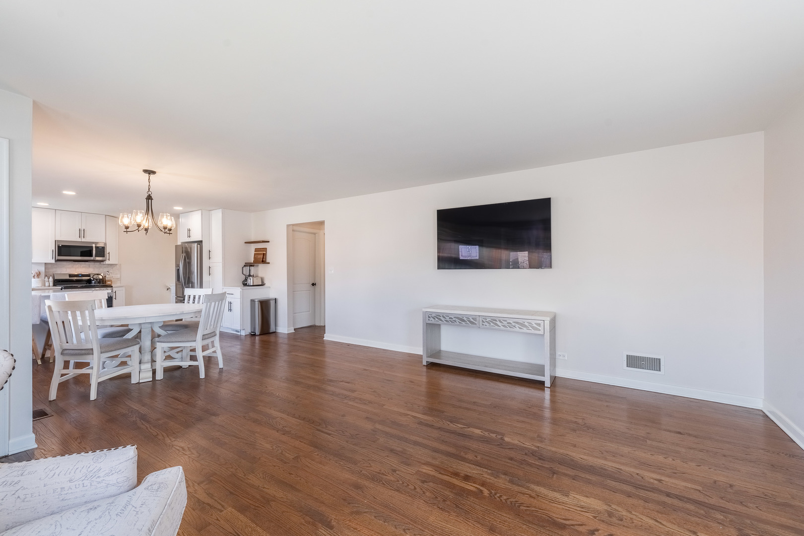 2335 14th Avenue North Riverside, IL 60546 - Photo 8 of 33 a view of a livingroom with furniture and a flat screen tv