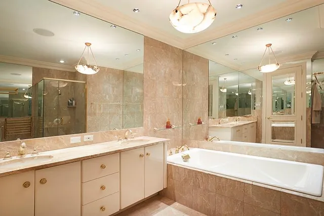 a bedroom with furniture and a book shelf