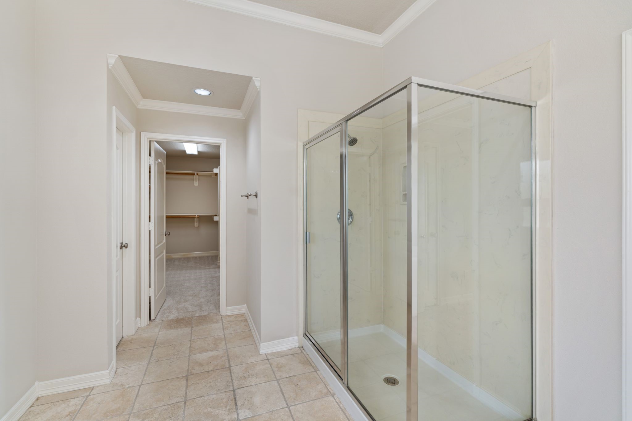 920 Asbury Street Houston, TX 77007 - Photo 28 of 33 a bathroom with a shower and a glass door