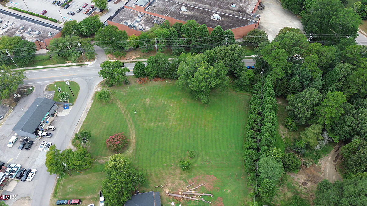 4600 Old Wake Forest Road Raleigh, NC 27609 - Photo 4 of 10 an aerial view of residential house with outdoor space and swimming pool