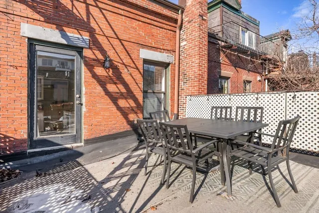 a view of an outdoor space with a patio