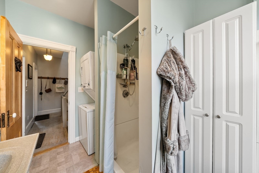 468 Shawmut Avenue, Unit 2 Boston, MA 02118 - Photo 15 of 30 a view of a bathroom with tub and shower