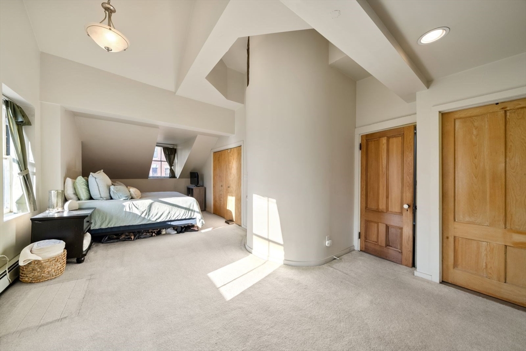 468 Shawmut Avenue, Unit 2 Boston, MA 02118 - Photo 18 of 30 a bedroom with furniture and a window